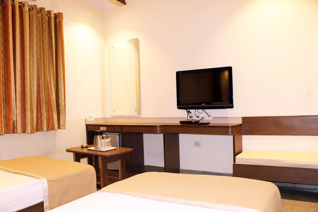 Hotel Stay Inn Bangalore Værelse billede